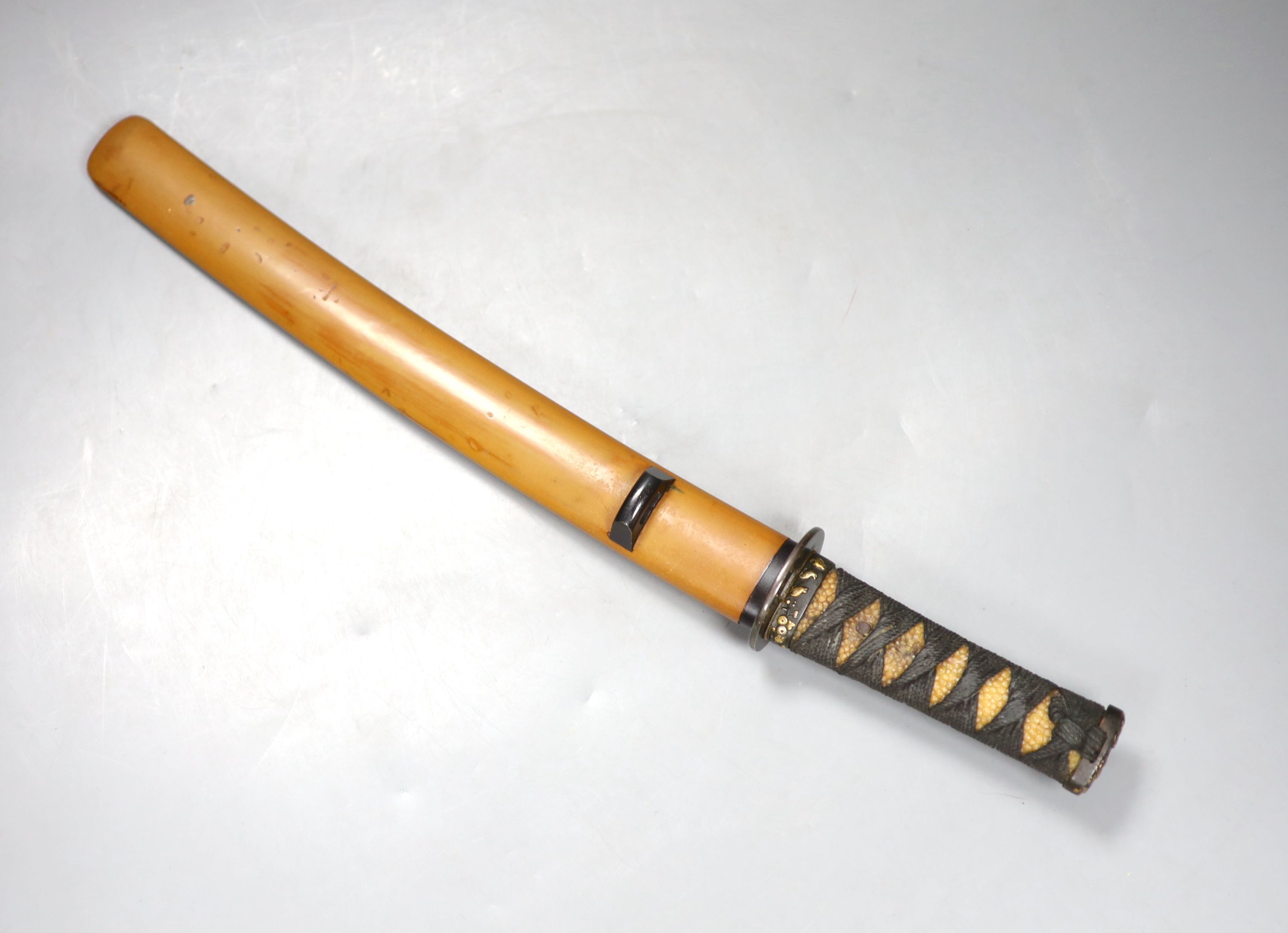 A Japanese tanto and scabbard, with associated fittings. Circa 1900